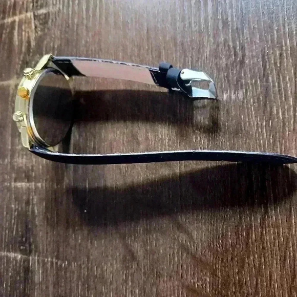 Men's black and gold tone watch - Picture 4 of 5